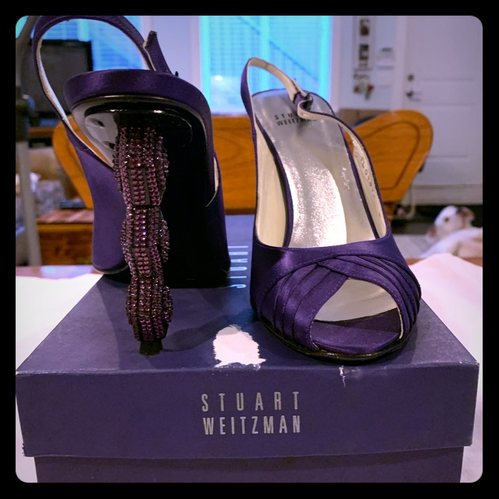 Purple satin high heels.